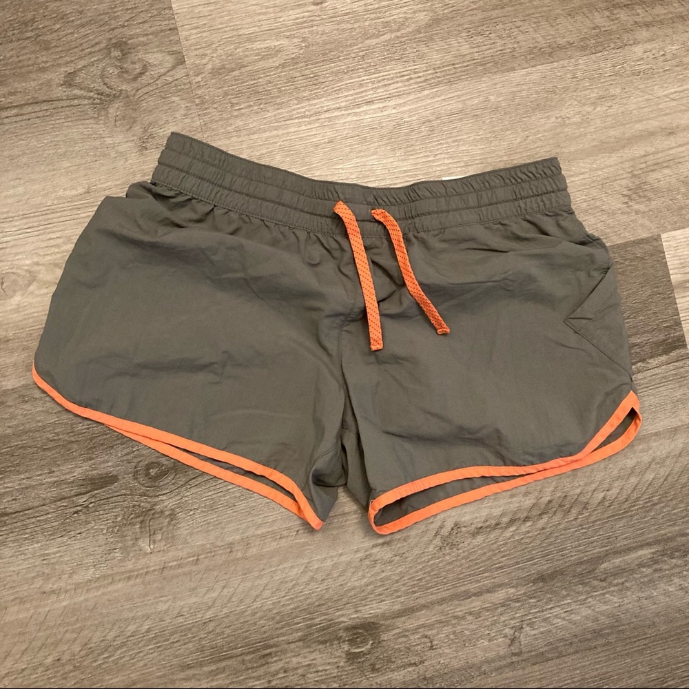 Columbia grey athletic shorts with coral piping